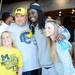 Michigan fans Tricia, Tom and Cassie Fox, 16, all of Tampa, take a photograph with quarterback Denard Robinson at Busch Gardens in Tampa, Fla. on Saturday, Dec. 29. Melanie Maxwell I AnnArbor.com